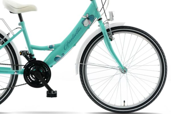 Zielony rower z kwiatowym wzorem