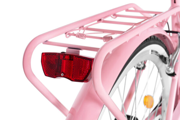 Rower z różowym bagażnikiem i światłem