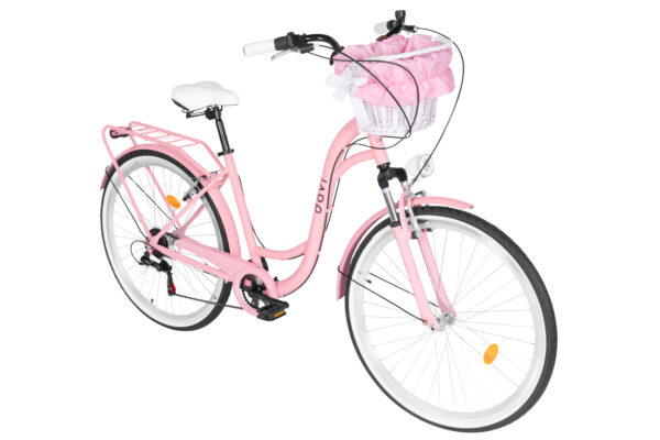 Różowy rower z koszykiem na kierownicy