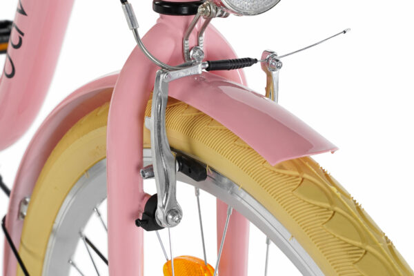 Rosa cykel med gul däck och metallbroms