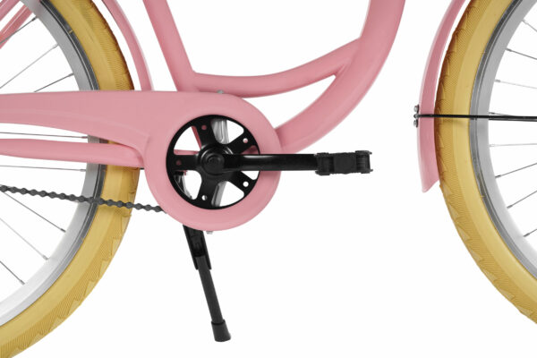 Rosa cykel med gula däck och svart pedal