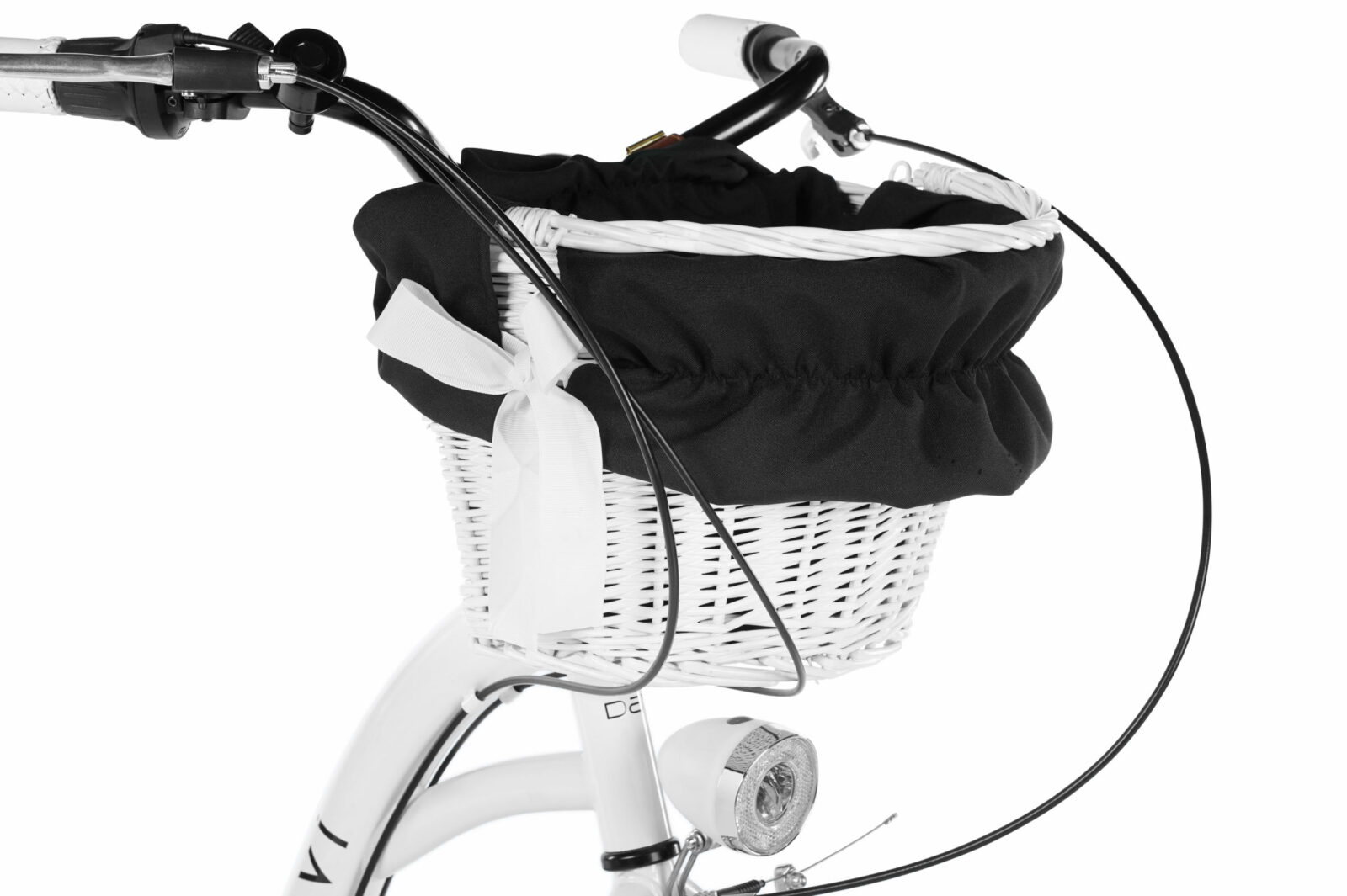Vit cykelkorg med svart tygöverdrag och rosett.