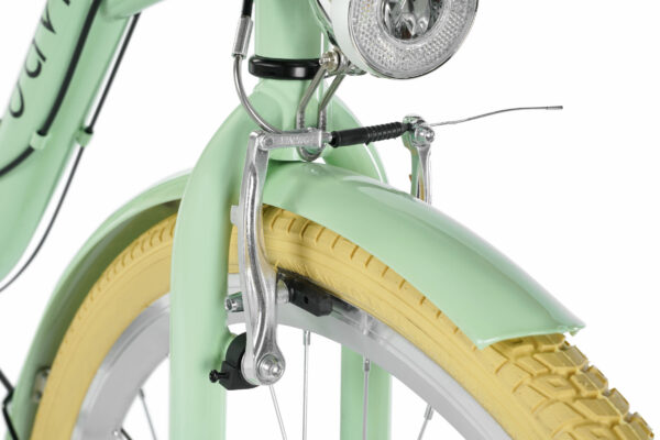 Grön cykel med guldfärgat däck och bromsdetaljer.