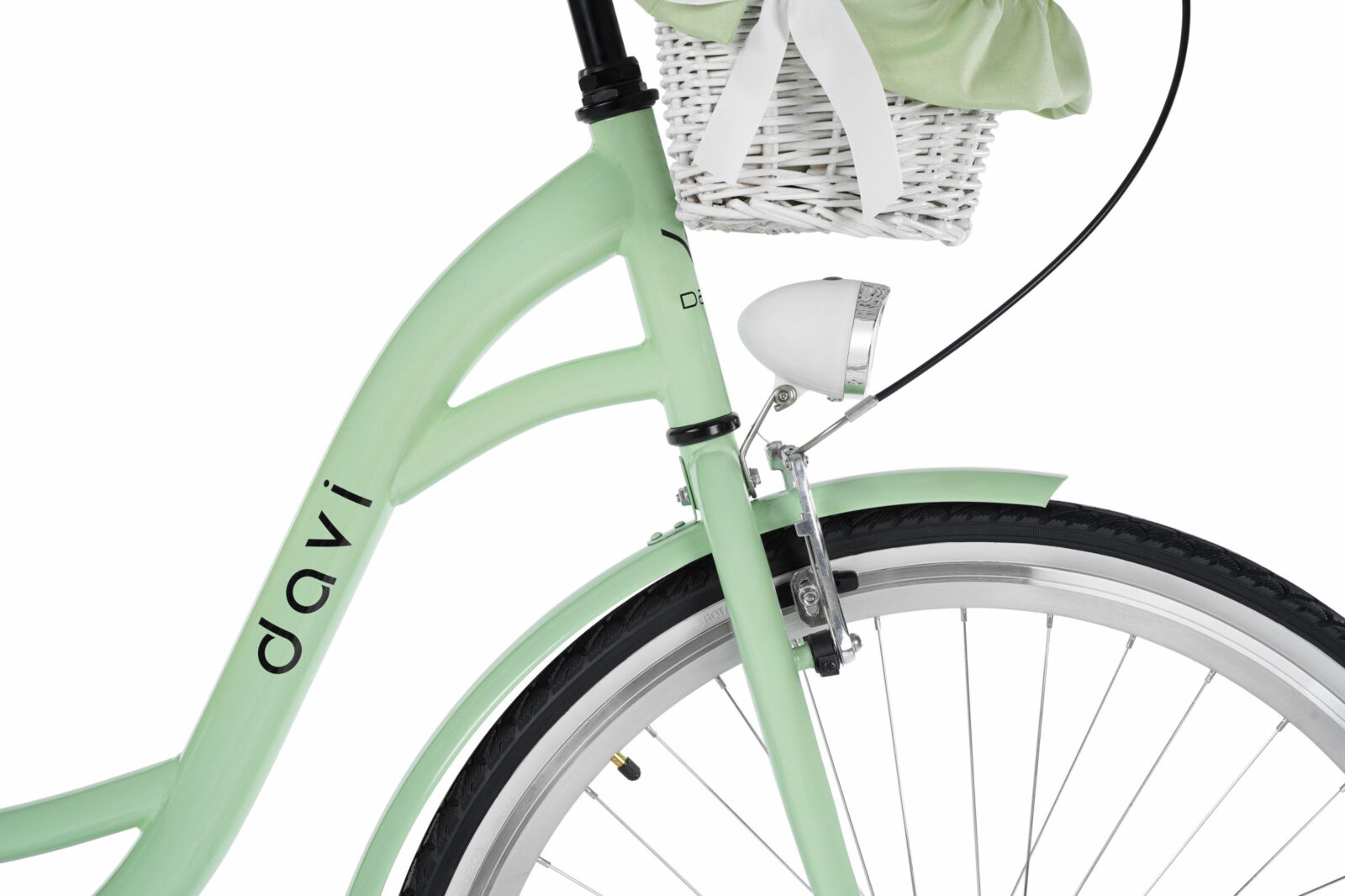 Grön cykel med vit korg på styret