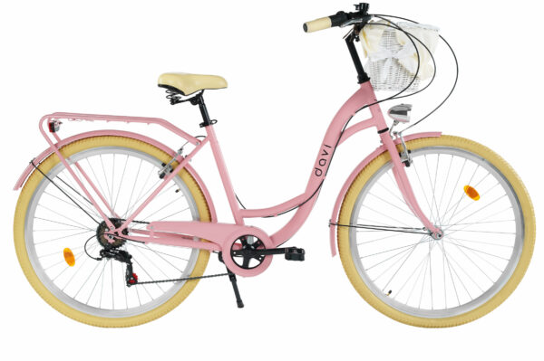 Rosa cykel med korg och beige däck.