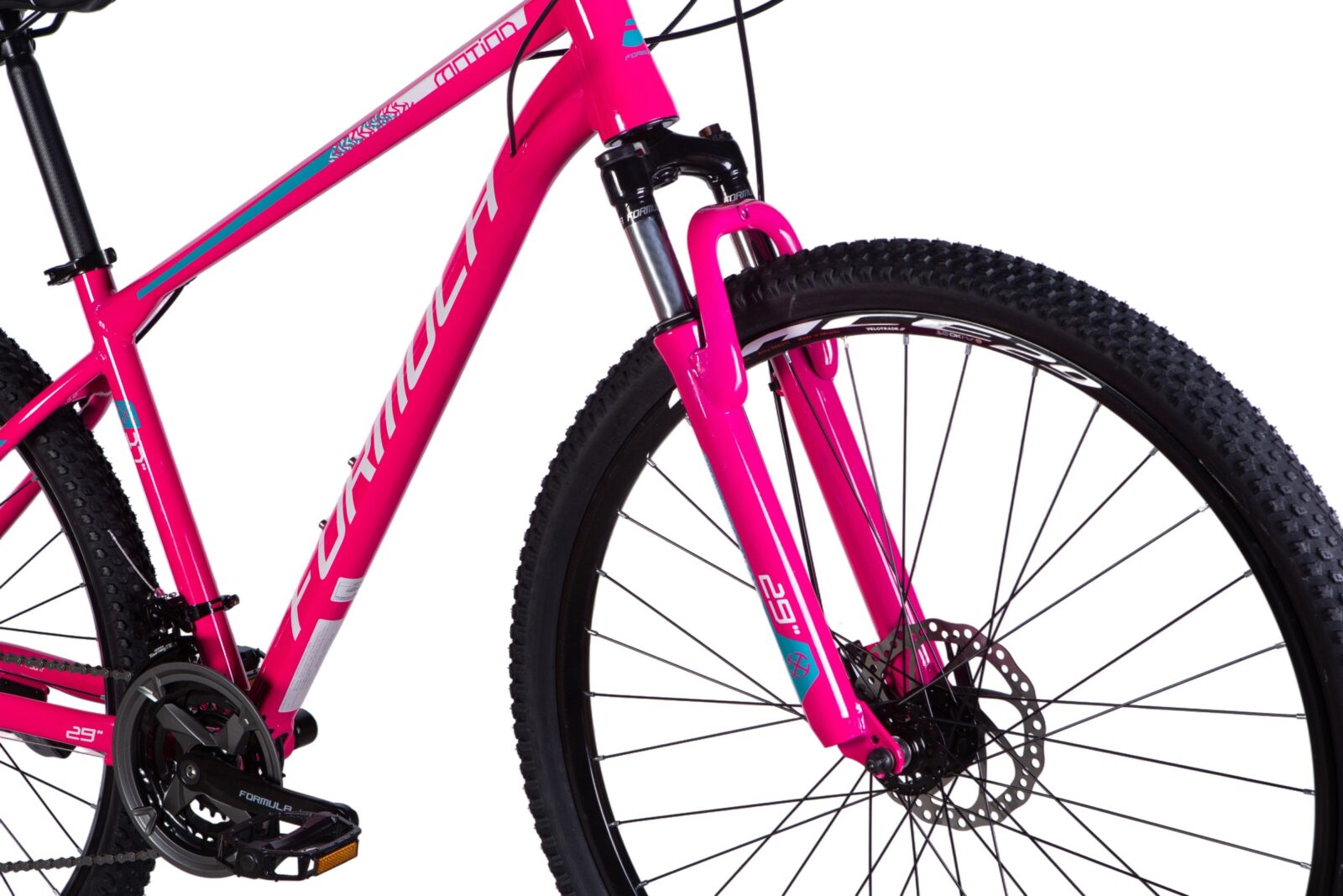 Różowy rower górski z dużymi kołami.