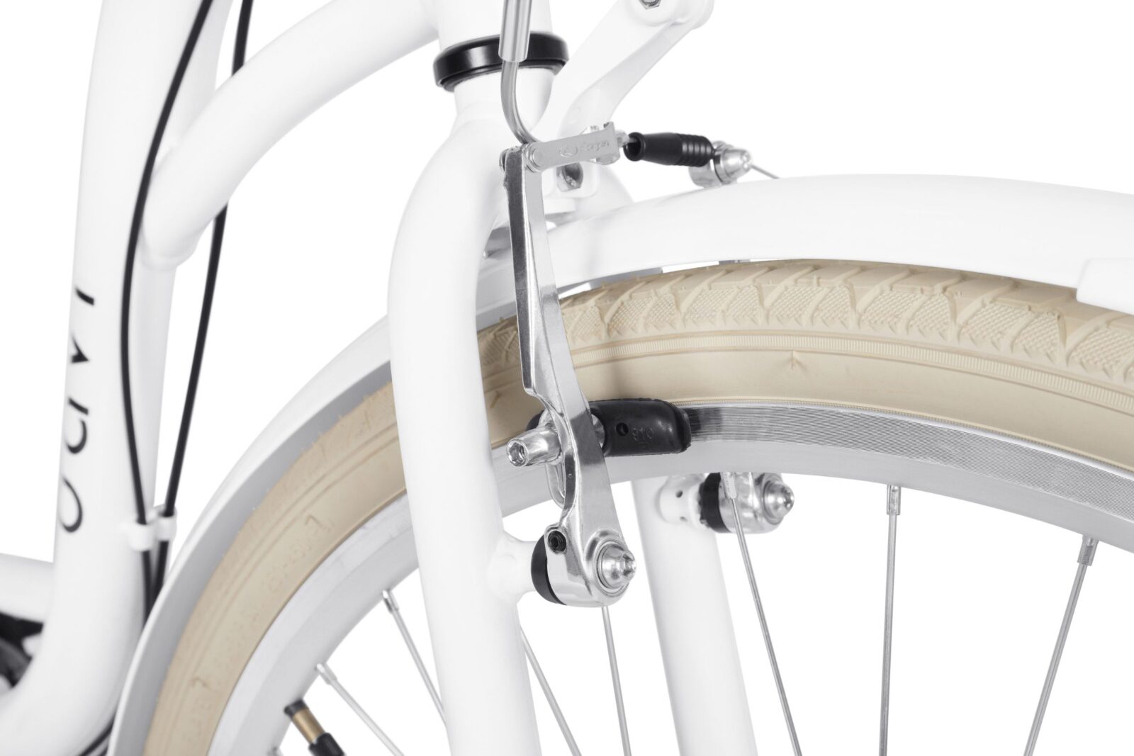 Zbliżenie na hamulec rowerowy i oponę.